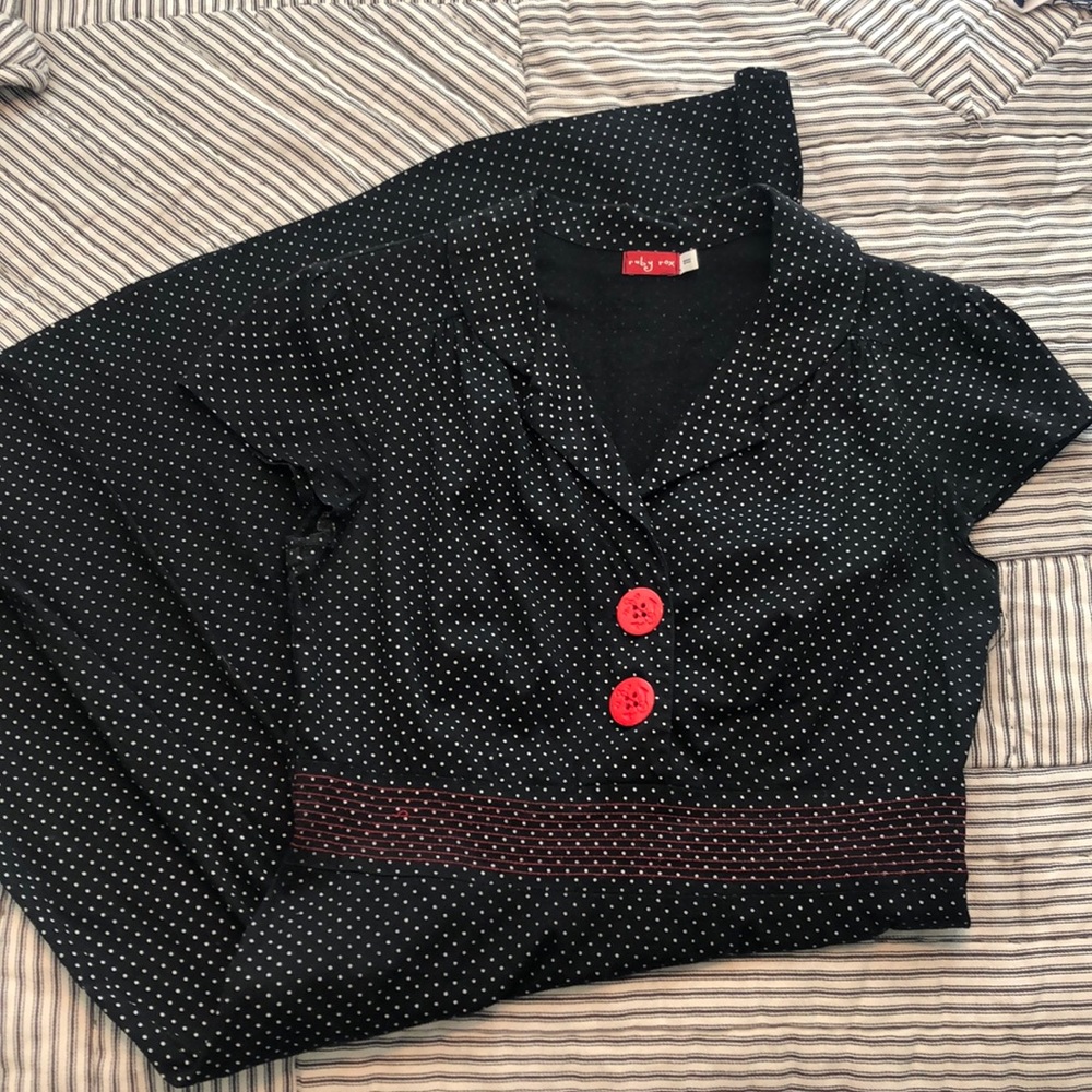 Black and white polka dot dress with red buttons